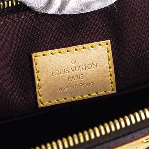 HOW TO AUTHENTICATE LOUIS VUITTON .